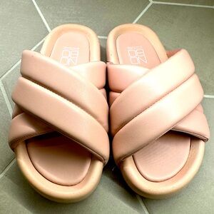 Comfortable pink slides.